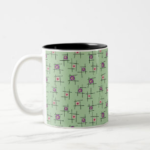 Geometrische bloemen en stokken op groene achtergr tweekleurige koffiemok