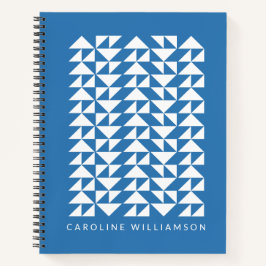 Geometrische driehoeksvormen in blauwgepersonalise notitieboek