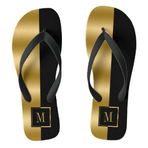 Geometrische gouden en zwarte stripmonogram teenslippers
