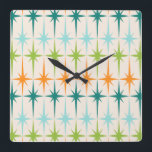 geometrische Starbursts Square Wall Clock Vierkante Klok<br><div class="desc">Vintage. Geometrie. Starbursten. Als je van die woorden houdt, is deze retro Geometrische Starbursts Wall Clock voor jou. Dit moderne ontwerp uit de midden eeuw heeft een crèmeachtergrond met rijen turquoise, kalkgroen, oranje en blauwgroen sterrenbursts. Dit modelontwerp paren prachtig met de Retro Atomic Mobile Pattern van Strange Little Onion en...</div>