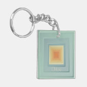  geometrische vierkanten (lichtblauw en geel) sleutelhanger (Voorkant Links)