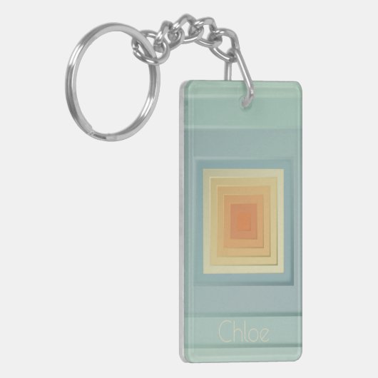  geometrische vierkanten (lichtblauw en geel) sleutelhanger (Voorkant Links)