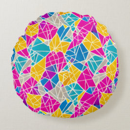 Geometrische vormen en lijnen in levendige kleuren rond kussen