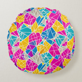 Geometrische vormen en lijnen in levendige kleuren rond kussen