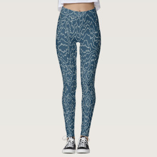 Geometrische witte bochtige lijnen op blauw leggings