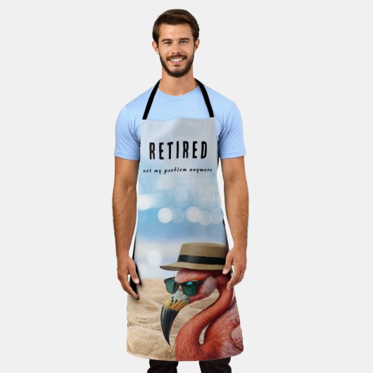 Gepensioneerde Flamingo op het strand met Pet & Zo Schort (Gedragen)