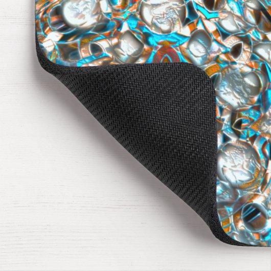 Geperforeerde blauwvis over witachtige textuur muismat (Hoek)