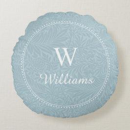 Gepersonaliseerd blauw botanisch patroon rond kussen