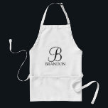 Gepersonaliseerd Manuscript Monogram en Naam Standaard Schort<br><div class="desc">De gepersonaliseerde eigenschappen van het Monogram en van de Gift van de Naam personaliseerde monogram in zwarte klassieke stijl van de manuscriptdoopvont en naam in zwarte klassieke serif doopvontstijl op witte achtergrond. Perfect als vakantiecadeau,  vaderdag cadeau voor vader en cadeau voor speciale gelegenheden.</div>