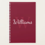 Gepersonaliseerd monogram en naam Burgundy Red Planner<br><div class="desc">De gepersonaliseerde Monogram en de Gift van de Naam kenmerkt gepersonaliseerde naam in de witte stijl van de manuscriptdoopvont en monogram in lichte wogunde rode serif doopvontstijl als achtergrond,  op wogunde rode achtergrond. Perfect als cadeau voor hem,  vaderdag cadeau en cadeau voor alle speciale gelegenheden.</div>