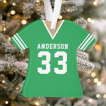 Gepersonaliseerde groene Football Jersey Ornament<br><div class="desc">Vier uw football ster met deze gepersonaliseerde groene football jersey ornament. Perfect voor het herdenken van een speciaal seizoen,  speler of team. Pas het aan met een naam en nummer om een unieke aandenken te creëer.</div>