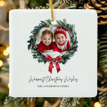 Gepersonaliseerde Kerstkrans met Foto & Naam Keramisch Ornament<br><div class="desc">Vier gekoesterde herinneringen met dit gepersonaliseerde Christmas Wreath-Ornament, met uw foto en naam omringd door een feestelijke vakantiekrans. Perfect voor het versieren van uw kerstboom of cadeau aan geliefden, dit aangepaste ornament is een prachtige manier om speciale momenten te herdenken. Dit ornament is gemaakt van hoogwaardige materialen en is zowel...</div>