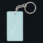 Gepersonaliseerde Lichtblauwe Minimalistische Brui Sleutelhanger<br><div class="desc">Draag een persoonlijk tintje waar je ook gaat met deze gepersonaliseerde lichtblauwe naam sleutelhanger. Met een zacht pastelblauwe achtergrond en een stijlvolle scripttypografie maakt deze aangepaste sleutelhanger een attent cadeau voor vrienden, familie of als stijlvol accessoire voor uw sleutels, tas of rugzak. Perfect voor verjaardagen, bruidsmeisje geschenken, of dagelijks gebruik....</div>