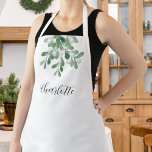 Gepersonaliseerde Mistletoe Greenery Schort<br><div class="desc">Dit kerstschort is versierd met waterverf minachting en stijlvolle typografie. Eenvoudig aan te passen. Omdat wij ons kunstwerk creëer,  zult u dit nauwkeurige afbeelding niet vinden van andere ontwerpers. Oorspronkelijke Waterverf © Michele Davies.</div>