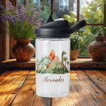 Gepersonaliseerde naam Schattigee Waterverf Dinosa Waterfles<br><div class="desc">Drijf de dorst van je kleine dinosaurusliefhebber in stijl met onze gepersonaliseerde naam Schattigee Waterverf Dinosaur Waterfles! Deze schattige waterfles heeft een charmant waterverf dinosaurusontwerp dat het verblijf gehydrateerd leuk en spannend zal maken. Gemaakt van duurzame en BPA-vrije materialen, is onze waterfles veilig voor kinderen en gebouwd om dagelijks gebruik...</div>