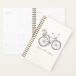 Gepersonaliseerde naam Whimsical Bicycle Schattige Planner<br><div class="desc">Blijf georganiseerd in stijl met deze charmante planner met een grillige illustratie van een schattige fiets in zachte lavendel en grijs, compleet met een mand met bloemen. Personaliseer het met jouw naam om het uniek van jou te maken! Perfect voor het bijhouden van uw plannen of het geven van geschenken...</div>