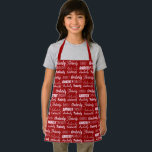 Gepersonaliseerde Rode Naam Collage Schattigee Ker Schort<br><div class="desc">Een feestelijk rood kerstgeschrift dat is gedecoreerd in negen verschillende lettertypen die je achternaam in het wit spellen. Een aangepast kinder cadeau met een leuke typografie.</div>