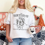 Gepersonaliseerde Spooky Halloween Groep Verjaarda T-shirt<br><div class="desc">Vier een Oktober verjaardag in stijl met onze gepersonaliseerde Spooky Halloween Group Verjaardagsfeestje T-Shirt! Dit shirt is ideaal voor Halloweenliefhebbers en heeft een levendig ontwerp van dansskeletten dat de feestelijke sfeer van het seizoen vastlegt. Maak elk shirt op maat met de leeftijd van de verjaardagseere en de naam van uw...</div>