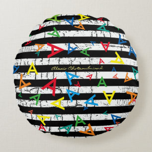 gepersonaliseerde stijl van initialen rond kussen