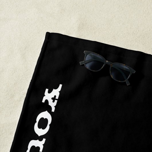 Gepersonaliseerde tekst Zwarte schedel Halve gezic Strandlaken (In situ)