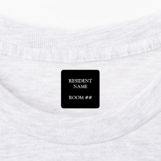 Gepersonaliseerde woonhuisstok op kleding labels