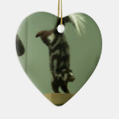 Gepotte kunk; museumtentoonstelling keramisch ornament (Rechts)