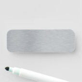 Geppenseerd glimmend gepolijst metalen naamplaatje (In situ)