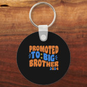 Gepromoveerd tot grote broer 2024, Big Brother Sleutelhanger (Achterkant)