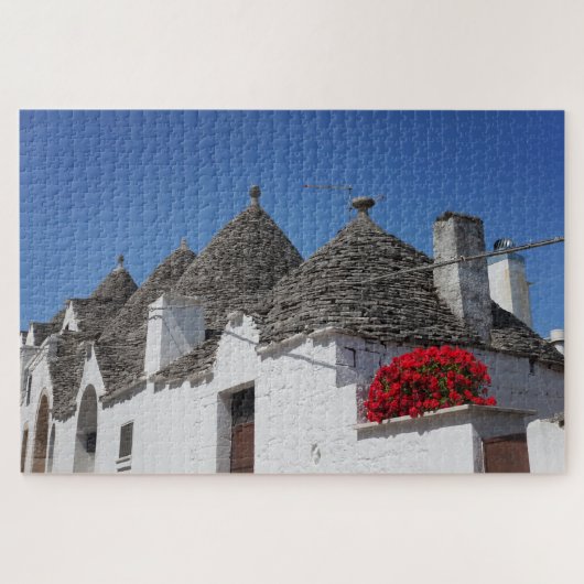 Geraniumbloemen en boomgaarden in Alberobello Legpuzzel (Horizontaal)