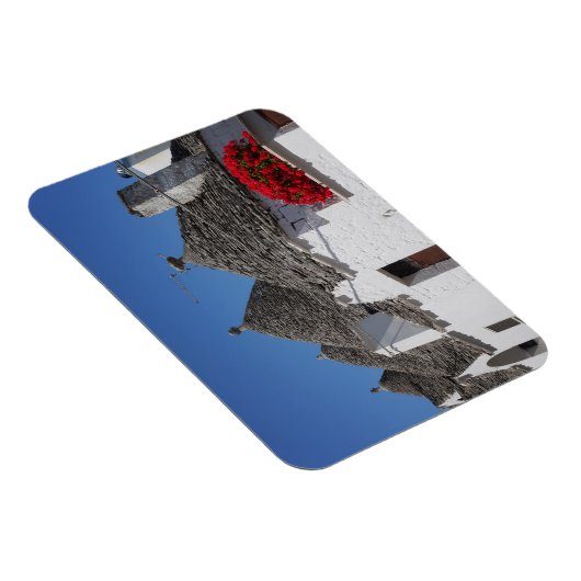 Geraniumbloemen en boomgaarden in Alberobello Magneet (Rechterzijde)