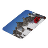 Geraniumbloemen en boomgaarden in Alberobello Magneet (Linkerzijde)