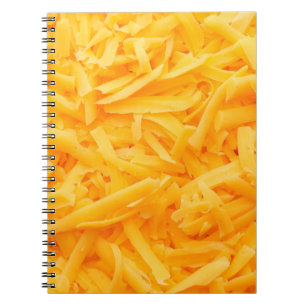 geraspelde cheddarkaas bovenaanzicht notitieboek