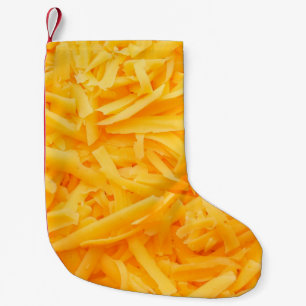 geraspte cheddar-uitzicht bovenaan kleine kerstsok