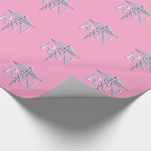 Geregistreerd zilver Caduceus lichtroze decor Cadeaupapier (Hoek)