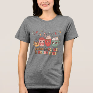 Gerelateerd aan Coffee & Merry Vibes Tri-Blend Shirt