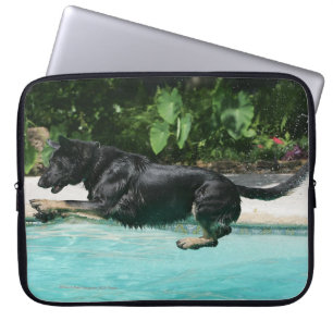 German Shepherd Jumping in Water Laptop Sleeve