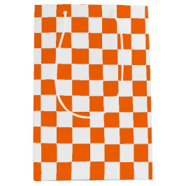 Geruit sinaasappel en wit medium cadeauzakje