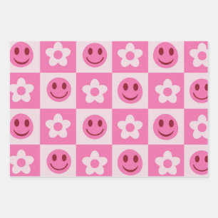 Geruite bloemen en vrolijke gezichten roze inpakpapier vel