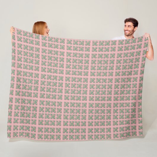 Geruite roze en groene fleece deken (In situ)