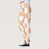 Geruite vierkanten perzik en witte geometrische re leggings (Links)