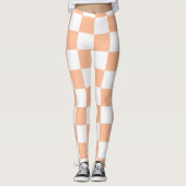 Geruite vierkanten perzik en witte geometrische re leggings (Voorkant)