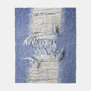 Gescheurd blauw denim: jeans textuur. fleece deken
