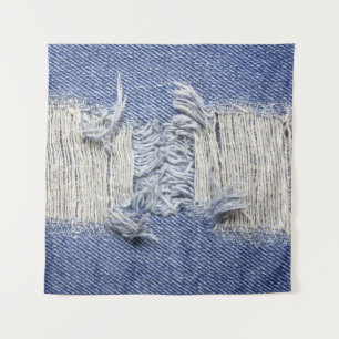 Gescheurd blauw denim: jeans textuur. wandkleed