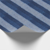 Gescheurd denim: blauwe jeans stof. cadeaupapier (Hoek)