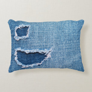 Gescheurde denim stof textuur, blauwe tinten. accent kussen