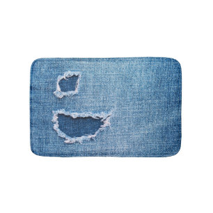 Gescheurde denim stof textuur, blauwe tinten. badmat