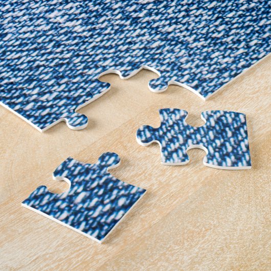 Gescheurde denim stof textuur, blauwe tinten. legpuzzel (Zijkant)