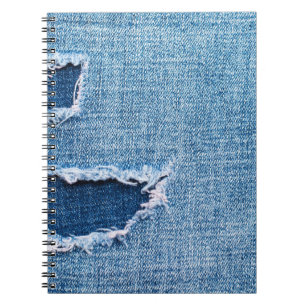 Gescheurde denim stof textuur, blauwe tinten. notitieboek