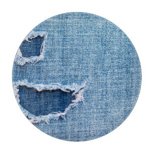 Gescheurde denim stof textuur, blauwe tinten. snijplank
