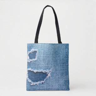 Gescheurde denim stof textuur, blauwe tinten. tote bag